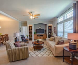 Interior of house model Oak Hill, furnished Living Room Pratt Homes, Tyler, Texas