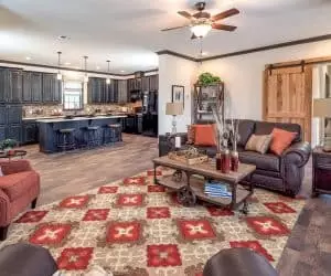 Fairfax Modular Home living room space with kitchen details made by Pratt Homes, Tyler, Texas