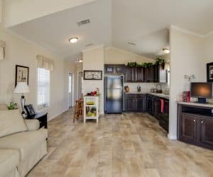 Kitchen with living room from the house model Whitehouse from Pratt Homes offer Tyler Texas