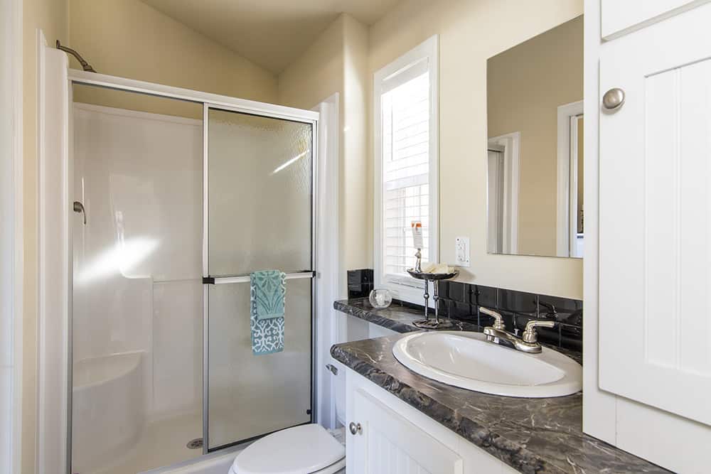 Shower in bathroom from house model APH-601 Pratt Homes, Tyler, Texas