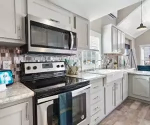 Kitchen of incredible tiny home Sweet Escape Pratt Homes, Tyler, Texas