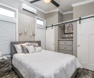 Bedroom of incredible tiny home model Mindy made by Pratt Homes, Tyler, Texas