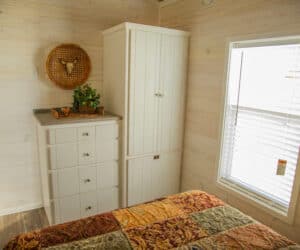 Bedroom from incredible tiny home model Titus made by Pratt Homes, Tyler, Texas