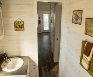 Bathroom from incredible tiny home model Titus Pratt Homes, Tyler, Texas