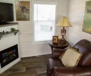 Living room from incredible tiny home model Titus made by Pratt Homes, Tyler, Texas