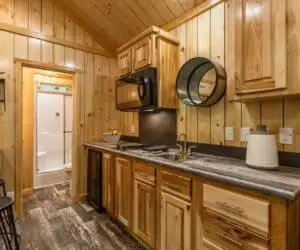 Wooden Kitchen from the affordable tiny home Mountain Cabin made by Pratt Homes, Tyler, Texas