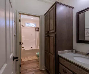 entrance to the bathroom in the house model Koinonia II made by pratt homes tyler texas
